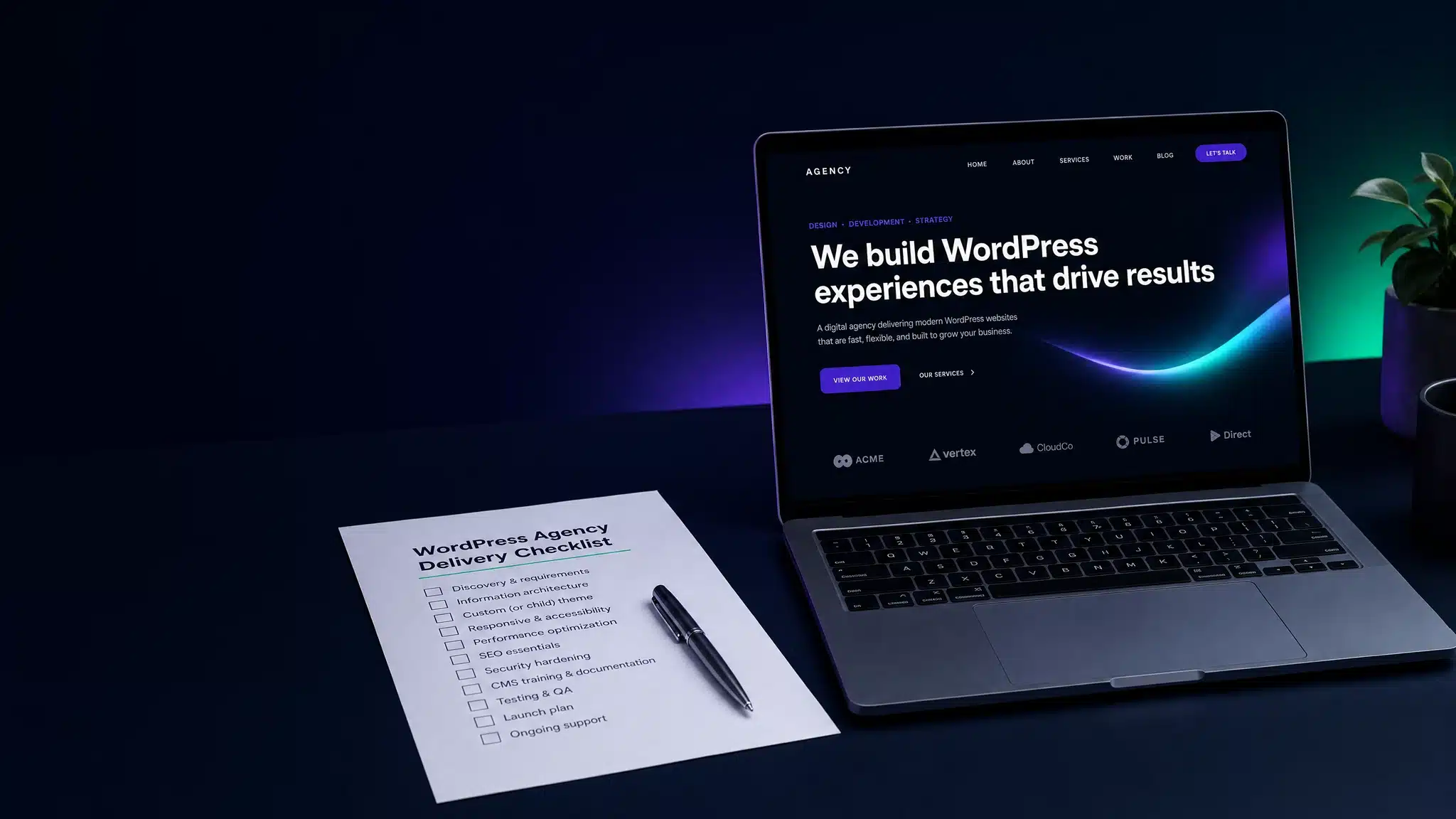 A laptop showing a polished agency sales pitch page beside a printed WordPress agency delivery checklist and a pen on a deep navy desk.